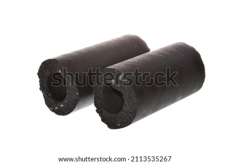 pressed charcoal isolated on white background