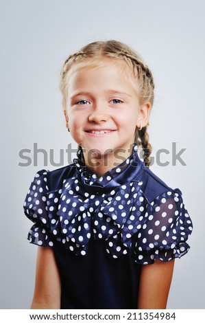 Smiling cute little girl on her picture day 