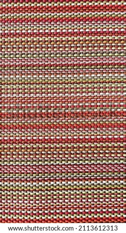 woven ethno pattern texture. Colorful braiding background. Royalty-Free Stock Photo #2113612313