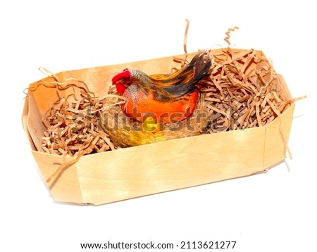 lovely Easter decorative hen in a festive nest