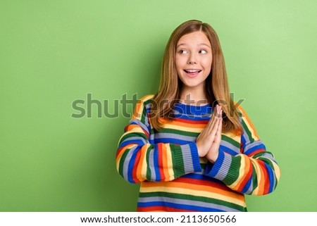 Portrait of attractive girly cheeful girl waiting anticipation copy space isolated over bright green color background