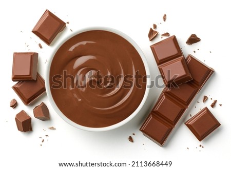 Bowl of melted milk chocolate and broken pieces of chocolate bar isolated on white background, top view Royalty-Free Stock Photo #2113668449