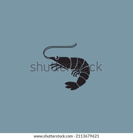 Black shrimp on a gray background.