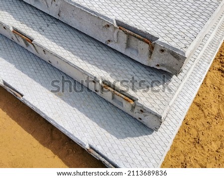 Reinforced concrete road slabs, production of road concrete slabs