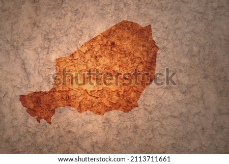 map of niger on a old ancient vintage crack paper background