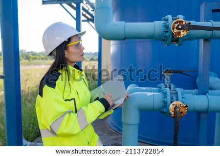 Environmental engineers work at wastewater treatment plants,Female plumber technician working at water supply