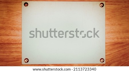 Vintage Notice Board on the Old Wooden Background