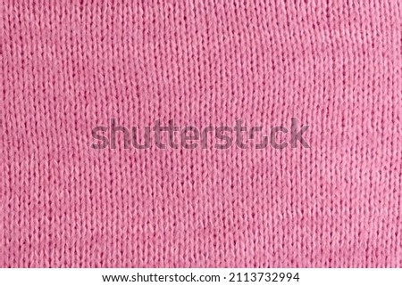 Soft pink woolen knitted textured cloth background mockup, copy space Royalty-Free Stock Photo #2113732994