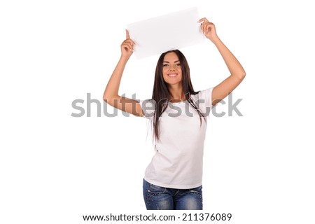 Beautiful girl holding a blank billboard isolated on white background 