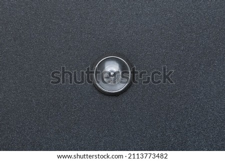 Peephole door eye look hole from spy security, safety close-up. Royalty-Free Stock Photo #2113773482