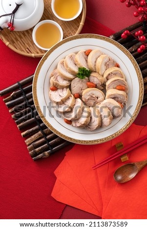 Top view of delicious sliced chicken roll soaked in Chinese wine named drunken shrimp for lunar new year's dishes. Royalty-Free Stock Photo #2113873589