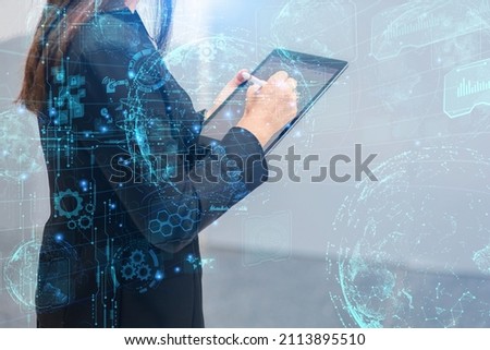 Businesswoman using laptop to showcase networking, innovation, online communication, metaverse world, concept of future world meta technology.
