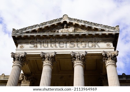 palais de justice loi french text on ancient building means in france courthouse justice court law in Perpignan city france Royalty-Free Stock Photo #2113964969