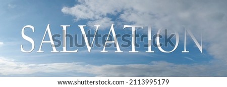 Abstract religious concept. Salvation in the air. Symbolic word inscibed amongst clouds on a light blue sky. Royalty-Free Stock Photo #2113995179