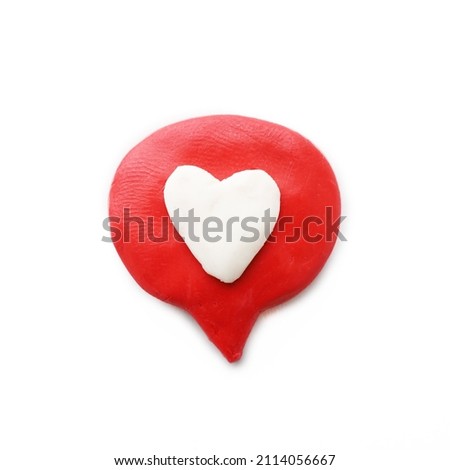 isolated plasticine speech bubble with heart symbol inside. Royalty-Free Stock Photo #2114056667
