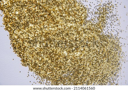 golden small confetti, golden background