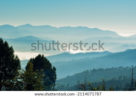 Green mountain range view, foggy cloudy morning  at Almora Uttarakhand.