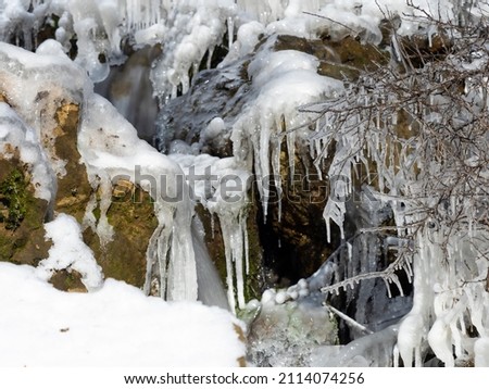 Frozen waterfall in the cold winter