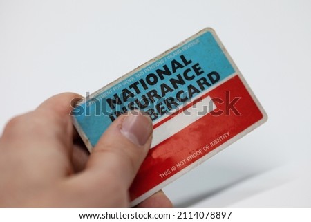 A blank Department of work and Pensions, National Insurance Numbercard. Nice close up of the detail of the card. This is used for gaining and paying NI on your job and work. Nice depth of field on. Royalty-Free Stock Photo #2114078897