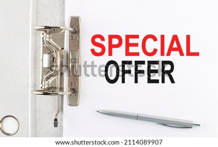 SPECIAL OFFER text on paper folder with pen. Business concept