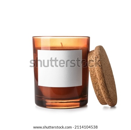 Wax candle in glass holder isolated on white background Royalty-Free Stock Photo #2114104538