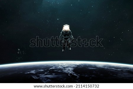 3D illustration Astronaut at spacewalk orbiting Earth. 5K realistic science fiction art. Elements of image provided by Nasa