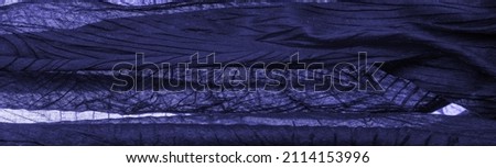 Texture. Background. Background. The dark blue fabric texture is luxurious shiny, it is an abstract silk fabric background.