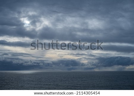 Winter storm brews off the coast and over Los Angeles, CA Royalty-Free Stock Photo #2114305454