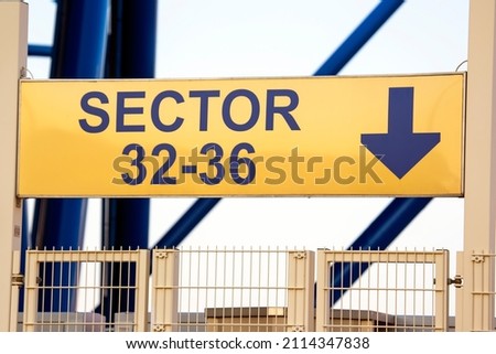 sign pointer sector aisle at the stadium. entrance to the grandstand of a sports event