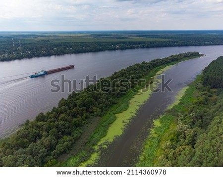 Flight over the river, river in the forest from a bird eye view, top view