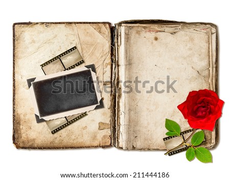 old book with aged pages isolated on white background. scrapbook elements rose flower, photo frame, film strips