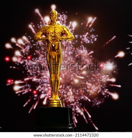 Hollywood Golden Oscar Academy award statue on night fireworks background with copy space. Success and victory concept.