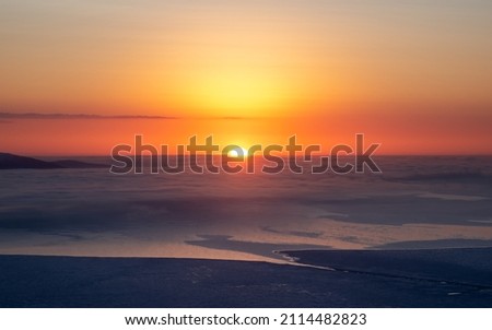 Soft focus. Beautiful Arctic sunset. Panoramic scenic colorful sky at dawn. Aerial view. Sunrise bright sky with White Sea. Top View from high altitude. Royalty-Free Stock Photo #2114482823