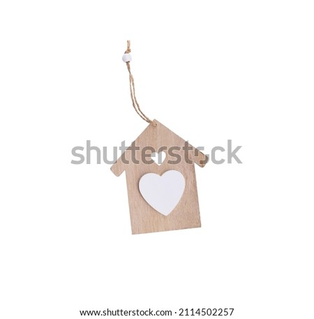 Wooden house with heart isolated on white background