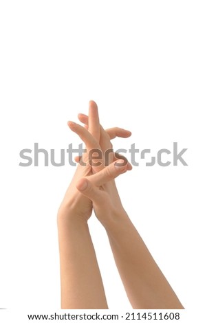 Clasped arms on a white background. Minimal hands love gesture concept. Two hand holding each other. Vertical photo. Valentine's day.