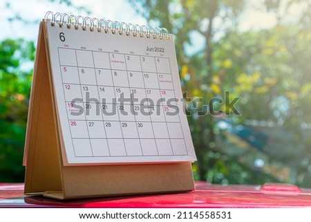 White June 2022 calendar on green background. 2022 New Year Concept