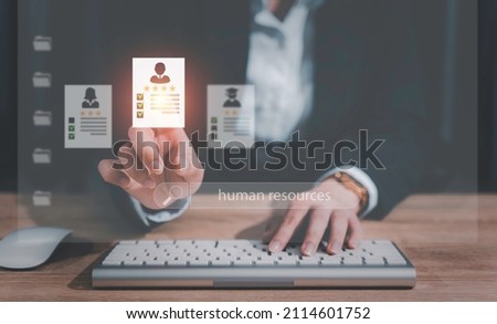 Human Resources HR management Recruitment Employment Headhunting Concept , Human Resources uses computers to search and select job applicantsThe process of selecting people to join the work of the HR. Royalty-Free Stock Photo #2114601752