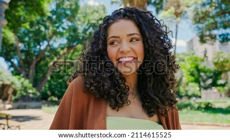 Smiling young latin woman. Joy, positive and love. Beautiful Brazilian girl. Royalty-Free Stock Photo #2114615525