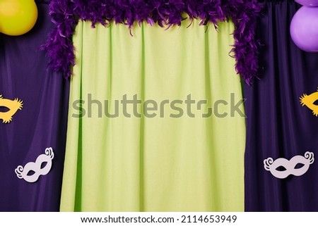 Colorful stage curtain for Mardi Gras festival. Copy space.