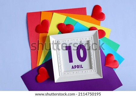 day of the month 10 April calendar    Calendar date in a white frame on a rainbow background.