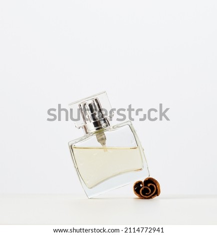 square glass perfume bottle isolated on white background