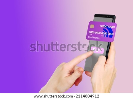 Mobile shopping. Buy button in smartphone. Concept of payments using NFC. Approval of transactions in NFC application. Smartphone with contactless payment in human hands. Cellphone on purple