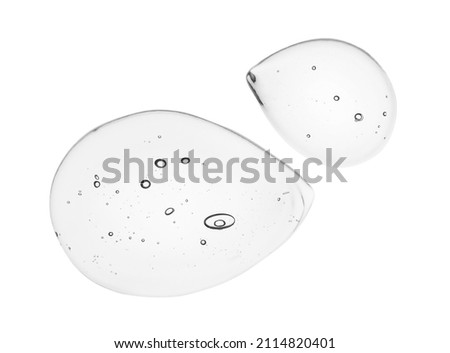 Serum gel drops. Clear liquid skincare product texture with bubbles. Cosmetic swatches isolated on white background Royalty-Free Stock Photo #2114820401