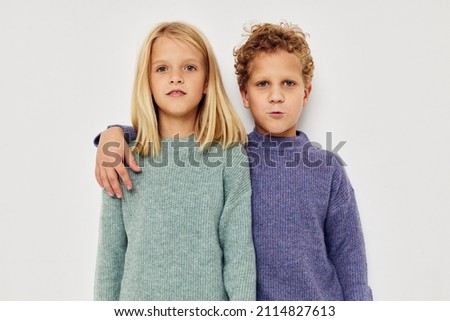 Portrait of cute children hug entertainment posing friendship Lifestyle unaltered