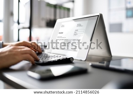 Online Digital E Invoice Statement On Hybrid Laptop Royalty-Free Stock Photo #2114856026