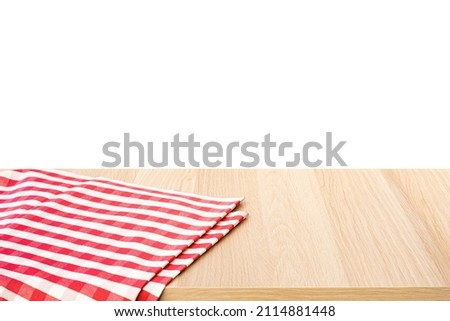 Napkin or fabric on wood table  with clipping path.for design key visual and background.copy space