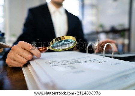 IRS Tax Audit. African Auditor Doing Debt Fraud Inspection Royalty-Free Stock Photo #2114896976
