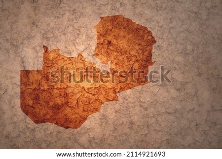 map of zambia on a old ancient vintage crack paper background