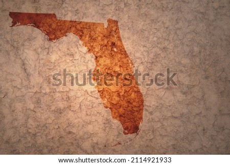 map of florida state on a old ancient vintage crack paper background