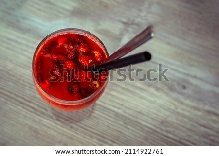Typical red aperitif with Nemi strawberry liqueur, Nemi, Rome, Lazio, Castelli Romani, Italy